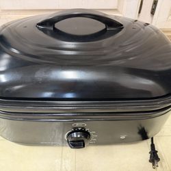 Like new!  Oster 18 Quart Roaster Oven