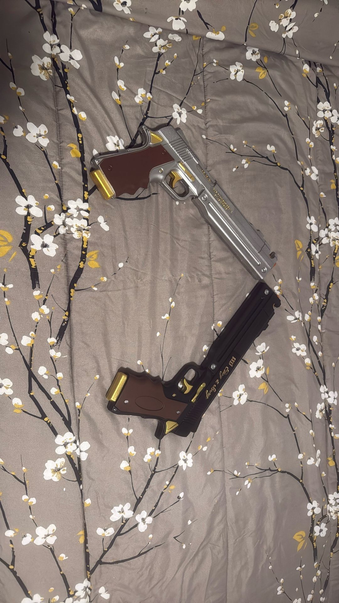 Ebony And Ivory Foam Guns (Read Description)