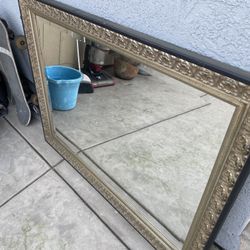 Gold engraved mirror