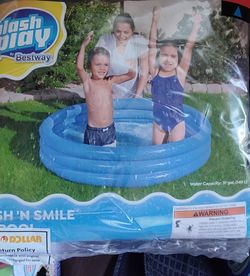 Splash and play inflatable pool