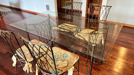 Tempered glass table, rod iron base and chairs