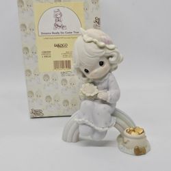 Precious Moments Dreams Really Do Come True Porcelain Girl Figurine 5" 1994 Doll

Excellent Pre-owned condition,  no flaws
Comes with original box 
19