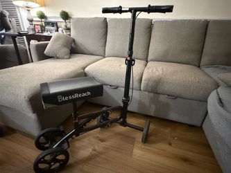 Black knee scooter