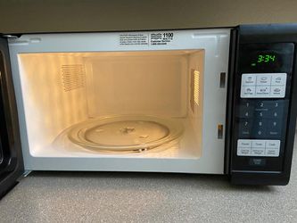 Refurbished Oster OGZJ1104 1.1 Cubic Feet 1100W Digital Microwave Oven