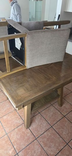 Table with chairs and entertainment center