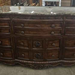 Marble Top 9 Drawer Dresser With Ornate Wood Carvings