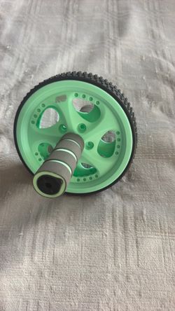 This is a Marika Ab Roller Wheel in a sea foam green color.