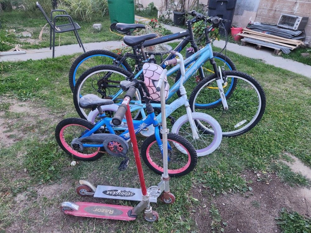 Lot of 4 Bikes and Two Razor Scooters. "Everything is in Working Condition " Price is for Everything 