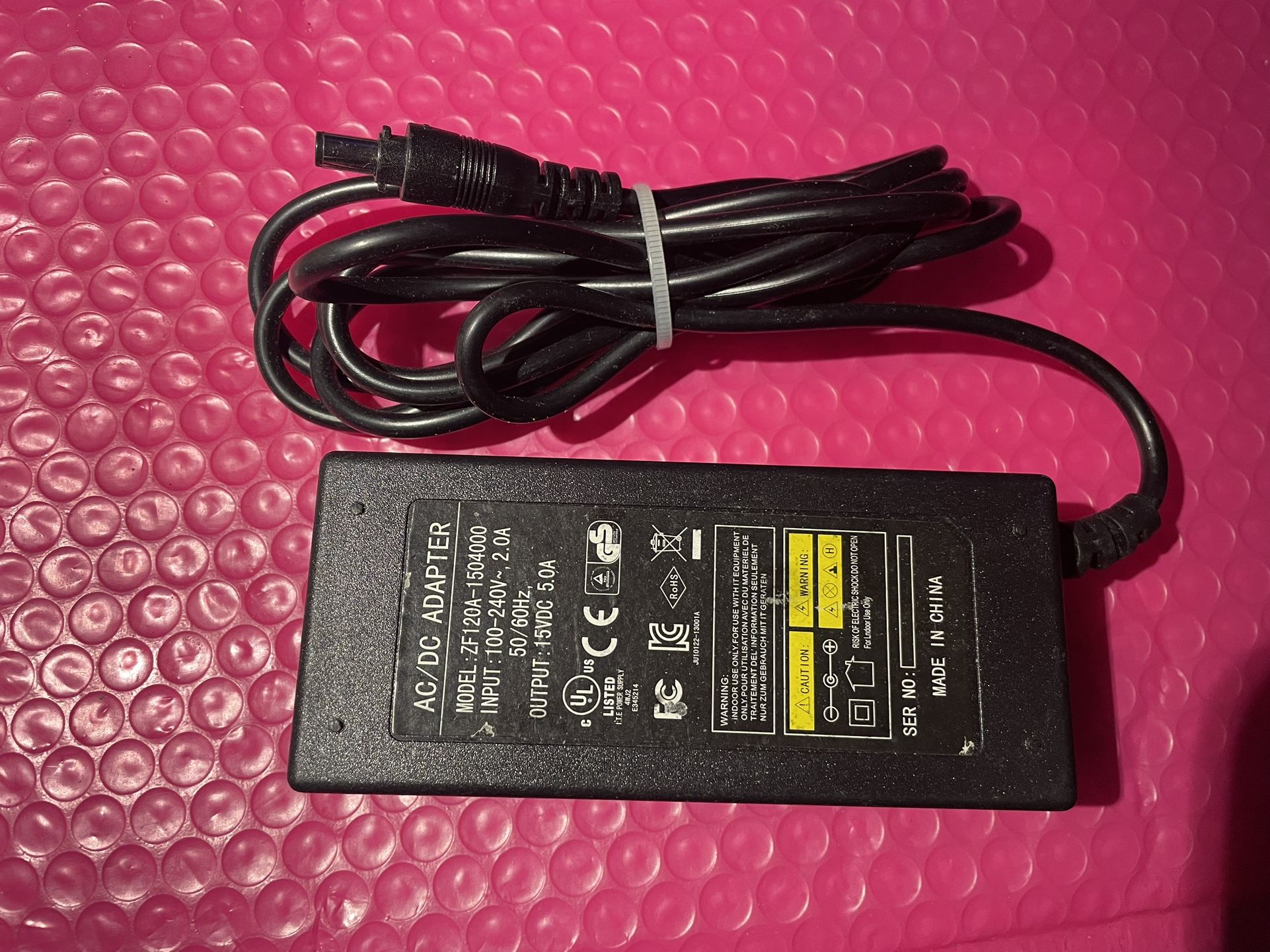 AC/DC adapter 15 V DC 5.0 amp she all pictures