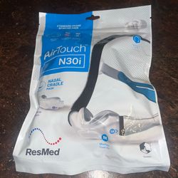 Resmed AirTouch N30i standard frame with Small-wide and Medium Cushion.