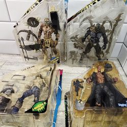 4 used Mcfarlane Spawn Action Figures with accessories