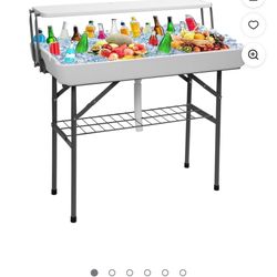 Foldable 4 ft Party Cooler Table with Drain, Storage Shelf & Matching Skirt | Portable Grazing Table for Outdoor Dining, BBQ, Tailgating, White