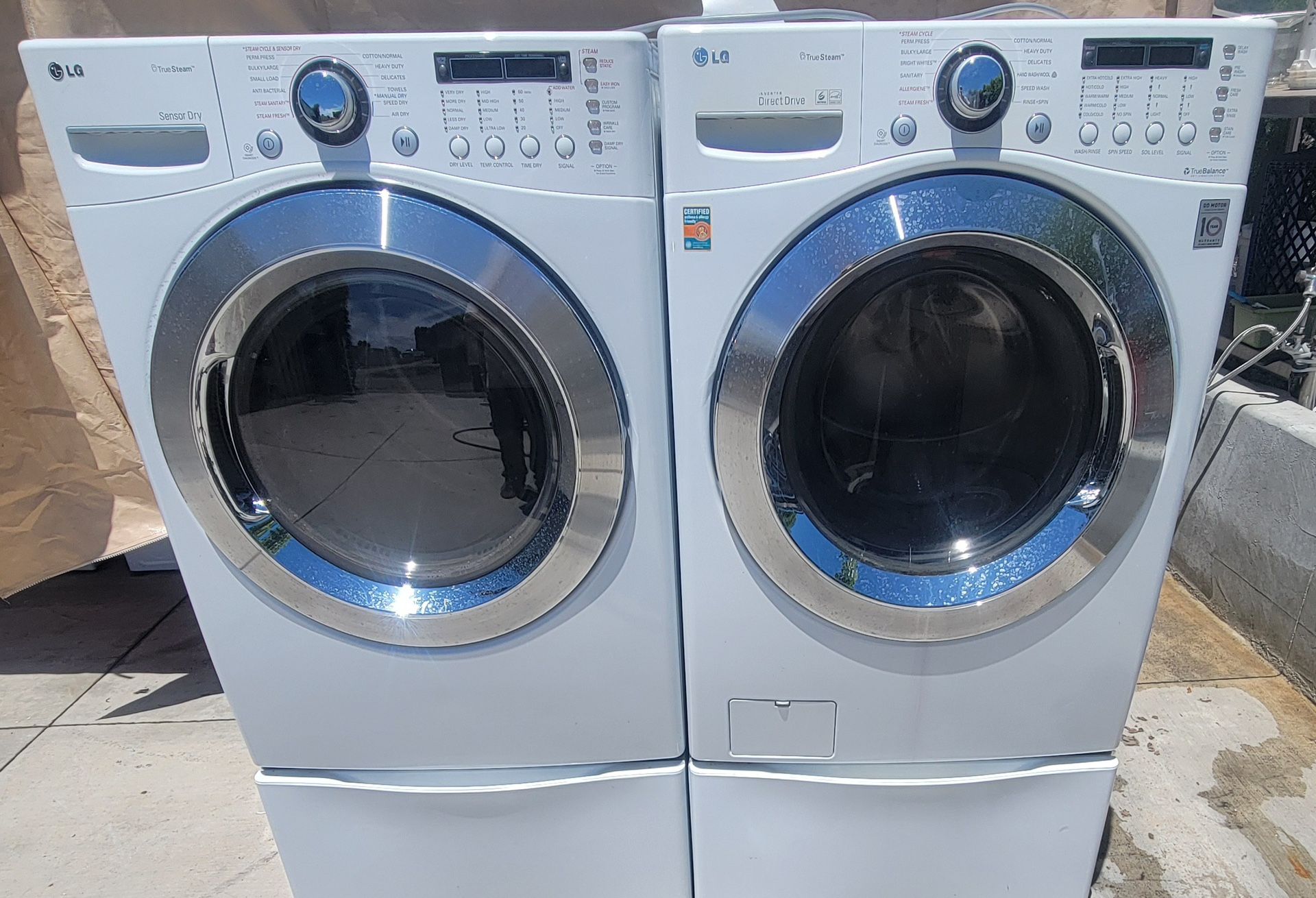 Lg Front Loading Laundry Pair On Pedestals With Steam Options