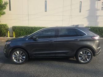2015 ford edge titanium  2.0 4cyl ecobooost 80k milles just smog cold ac clean title runs good no problems reg current located in pomona 9o9236I97o ru