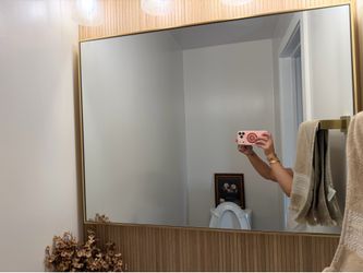Rectangular bathroom mirror in brass gold