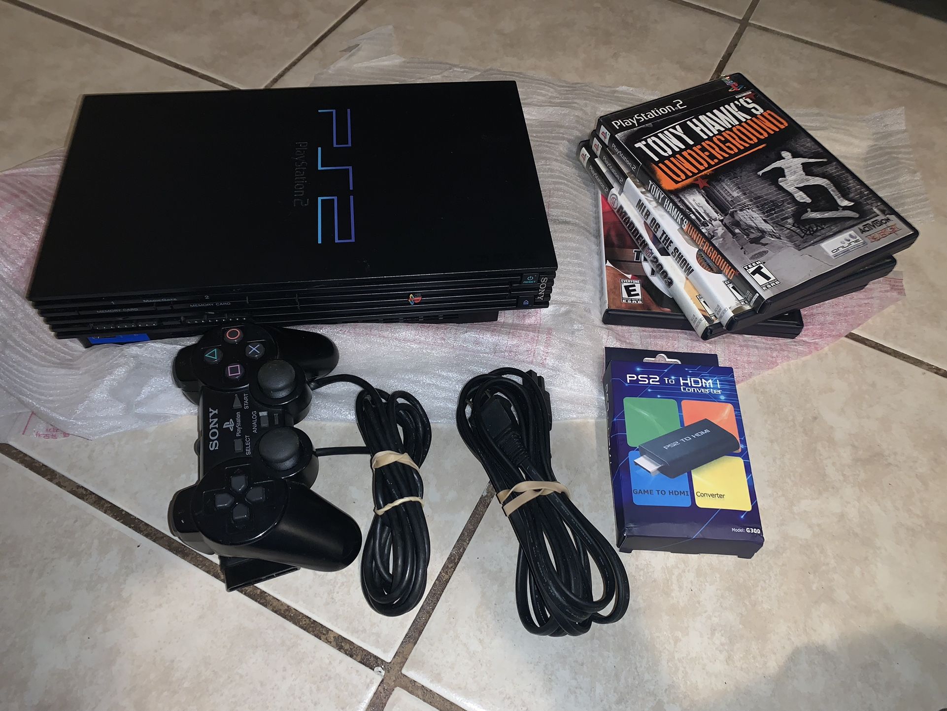 PLAYSTATION 2 SYSTEM WITH GAMES