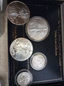 2002 and two 2015 silver walking liberty