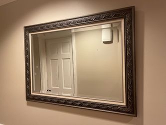 Ornate mirror in bronze