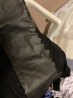 Woman’s size 20 leather pants with lace cut outs