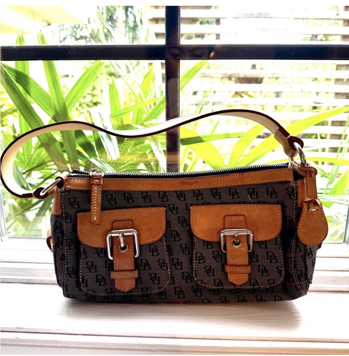 Dooney & Bourke tan brown shoulder bag with charms..