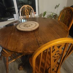 Dining table with 6 chairs and insert