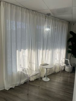 2 clear ghost chairs