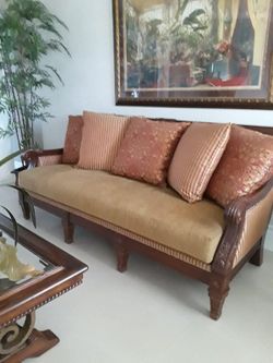 Hardwood cushioned sofa