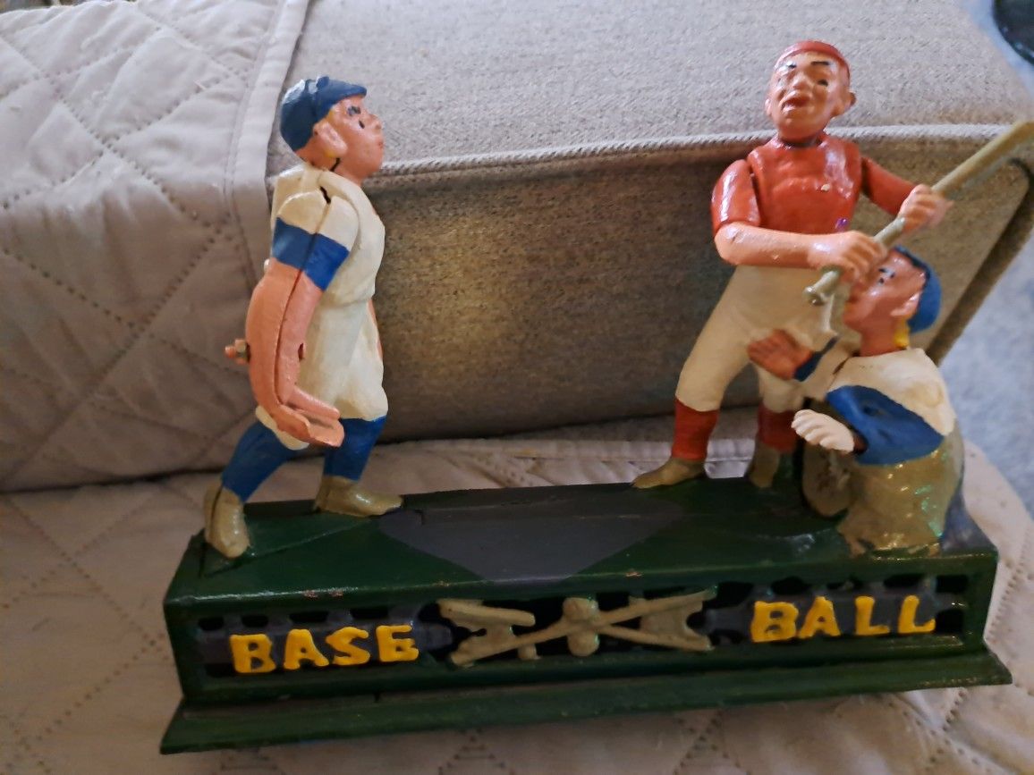 VINTAGE CAST IRON MECHANICAL BASEBALL BANK