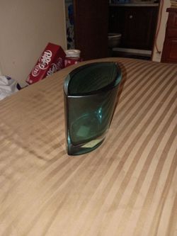 a teal / forest green cased art glass vessel
