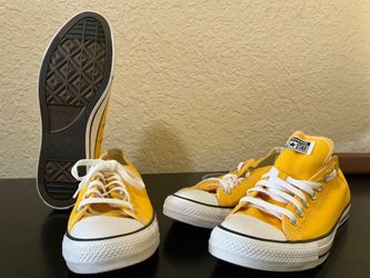 Brand new yellow chucks 75 each