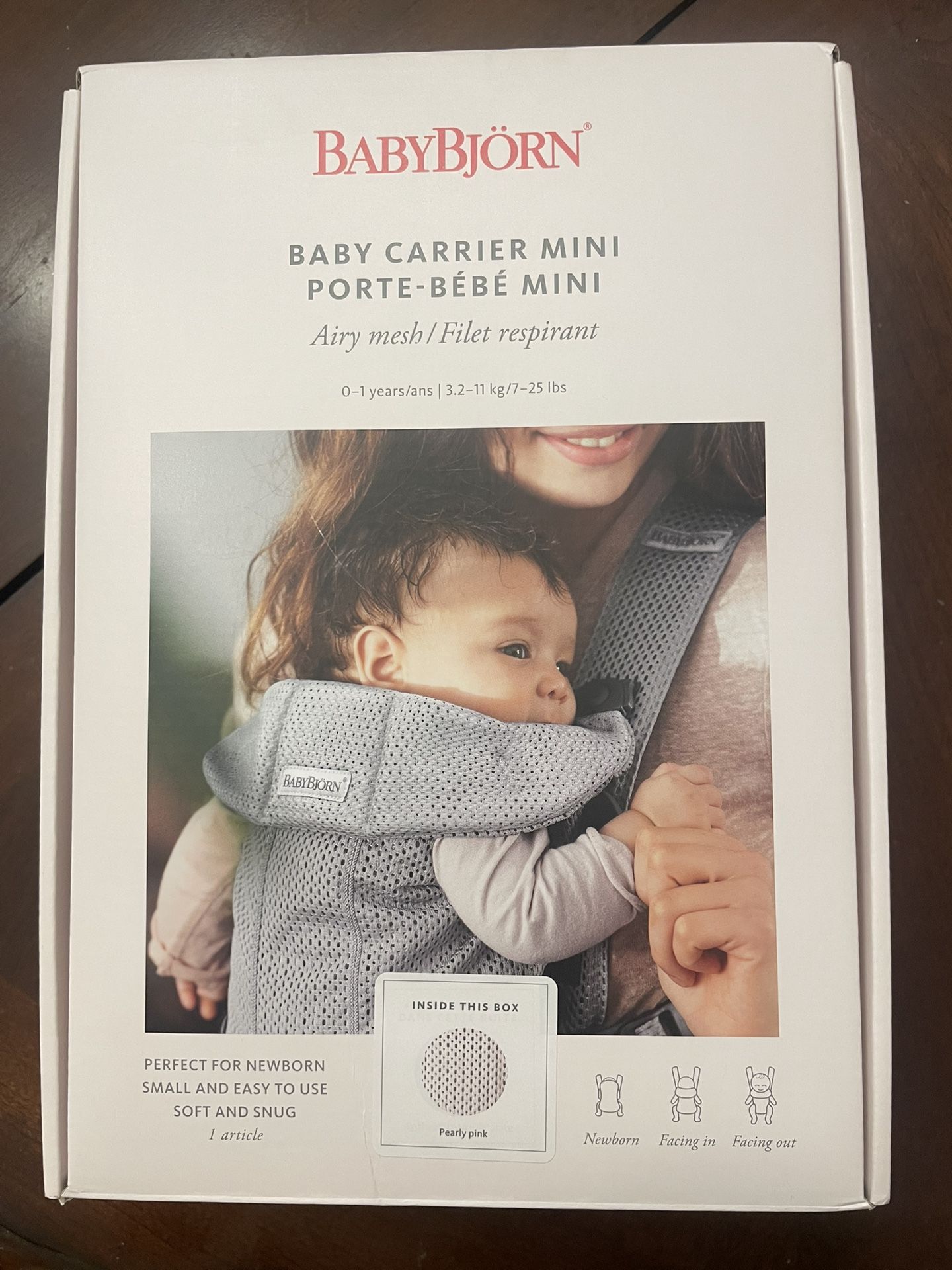 BabyBjörn Baby Carrier Mini in a pearly pink mesh (brand new). 