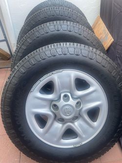 18” factory style 5 lug steel rim along 18” Tundra tires