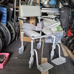 SHOWER CHAIR COMMODE ON WHEELS