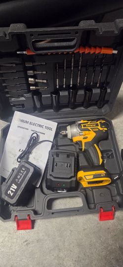 1/2 inch impact driver set with battery, charger, sockets and bits.