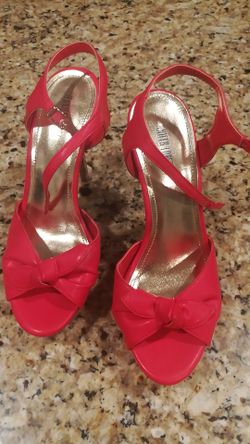 Hot pink high heel shoes