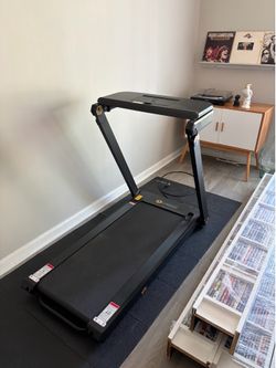 Foldable walking pad