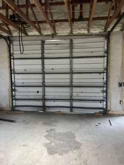 Garage Door Broken Spring Opener Off Track Adjustment Replace And Parts