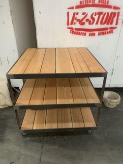 Custom Steal And Wood Industrial Shelves On Wheels