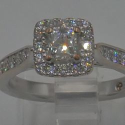 14kt white gold engagement ring size 7 The Leo Diamond Princess Cut 0.44 points, G color, VS1 clarity. Very good symmetry. total weight 3/4 CT (S). + 