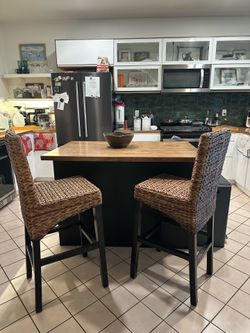Two rattan bar stools $150  for both!