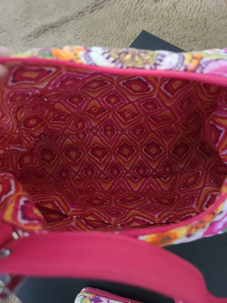 Pink Vera Bradley Purse with wallet.  Both items are used. The wallet has a little  more wear than the purse.