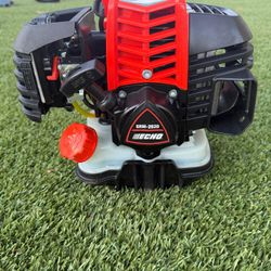 Echo srm 2620 25.4 cc Gas 2-Stroke X Series Pro Straight Shaft String Trimmer with High Torque Gear Ratio and Speed-Feed Bump Head