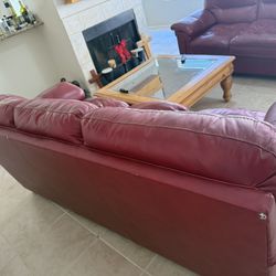 Matching loveseat and sofa red 100% leather couches good condition