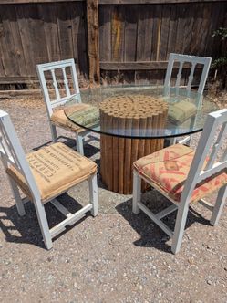 Glass top table and 4 chairs