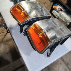 GMC Sierra Headlights 07-13 