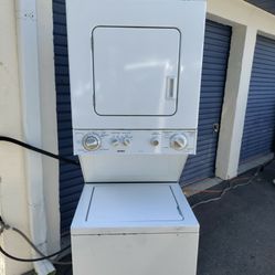 very clean Kenmore 24-in stackable washer dryer with warranty