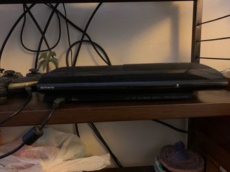 PS3 SuperSlim w/ Games & Controls