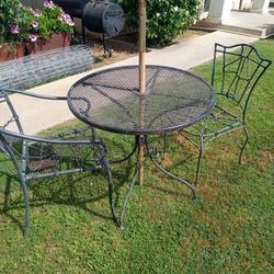 Right Are In Table With Two Chairs And Umbrella