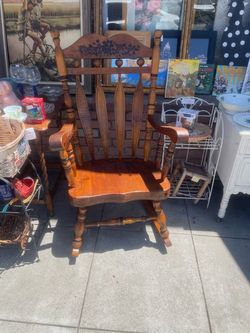 Antique large solid wood rocker rocking chair