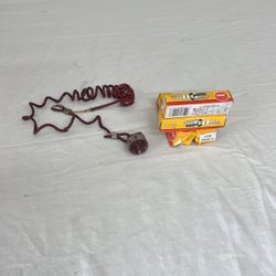 Killswitch and spark plugs for Suzuki outboard motor
